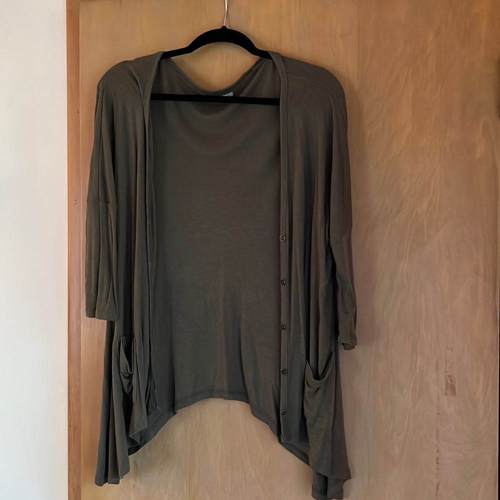 Olive green pocket cardigan with buttons. New condition. Half length sleeves